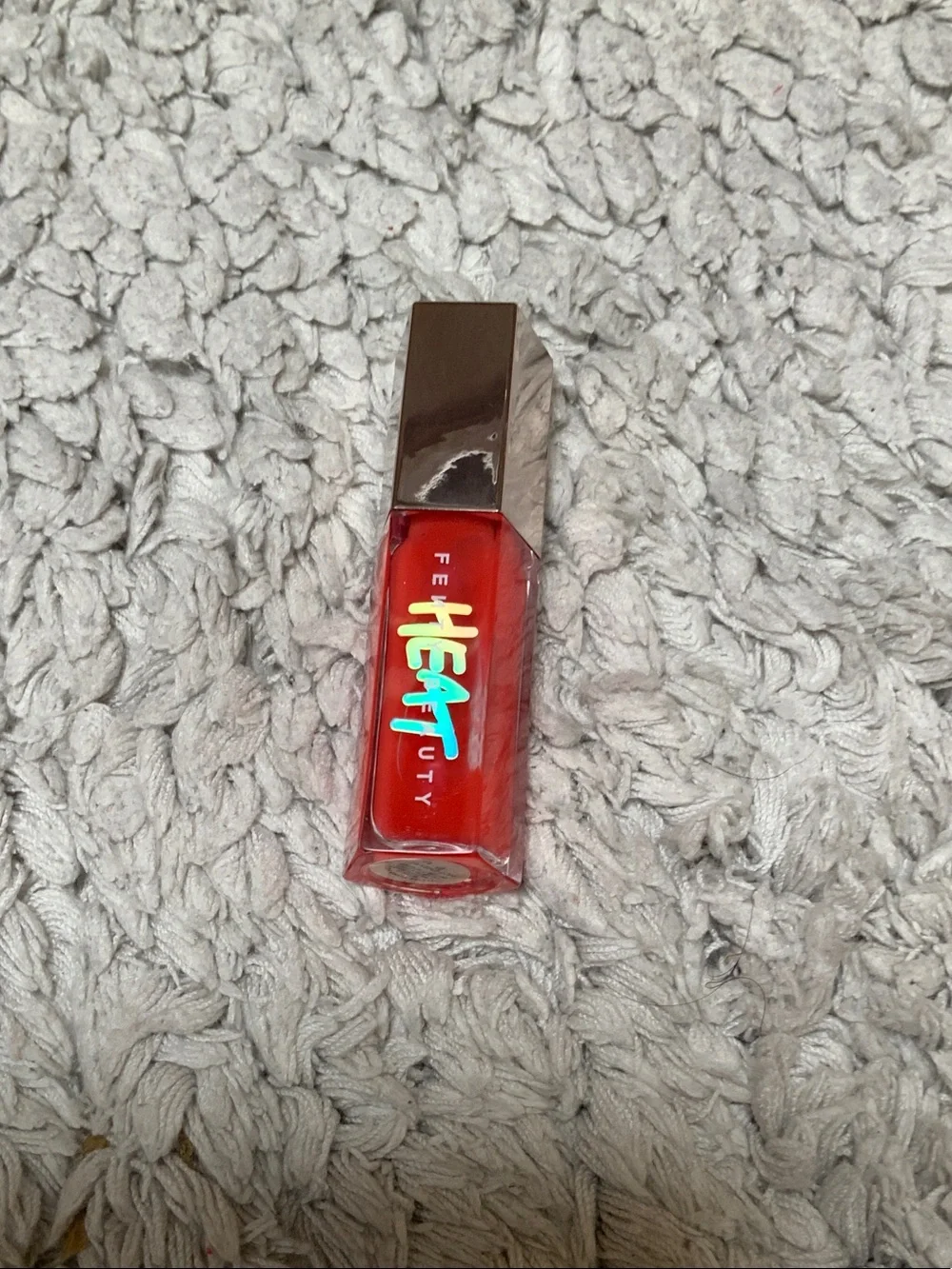 Fenty Beauty Heat Lip Gloss in Bright Red